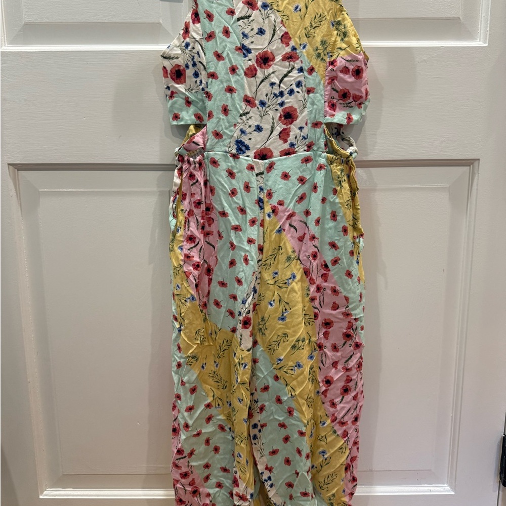 Ava + Yelly colorful jumpsuit with cut out sides